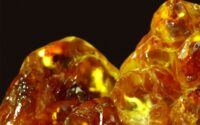 a close up of some very pretty yellow rocks
